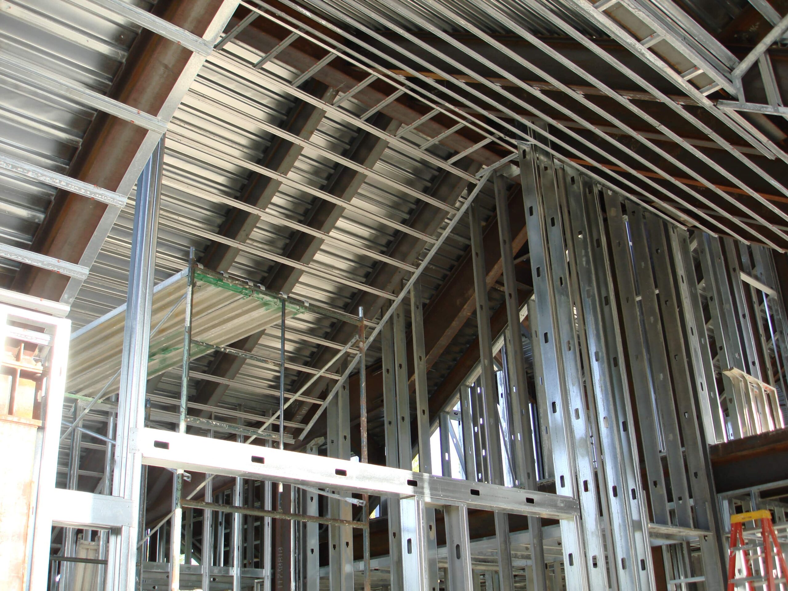 Metal Stud Framing on New Construction by Showcase Drywall.